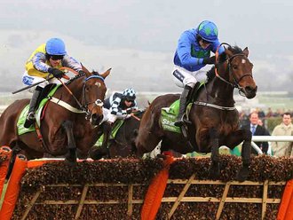 Hurricane Fly (Ruby Walsh) jumping the last on route to winning the Stan James Champion Hurdle Cheltenham 2011
